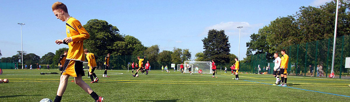 Football game being played at Christleton All Weather Pitch